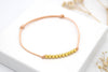 pfirsichfarbenes Schiebeknoten Armband 10 Perlen 925 Silber vergoldet