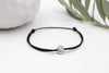 buddhistisches Armband schwarz mit Buddha Perle silberfarben
