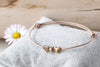 Lederarmband für Frauen mit 2 Herzen und Stern in rosegoldfarben und Schiebe Schließe