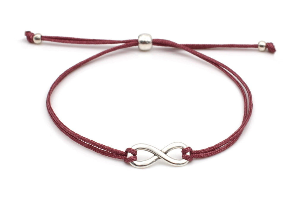 Infinity Armband silber mit aubergine Red farbenem Makrameeband und Kugelverschluss in silber