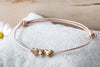 Lederarmband Damen Herz und Stern in rosegoldfarben und Schiebeknoten Verschluss