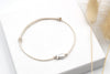 Armband Fisch in Ivory Creme und Schiebeknoten als Verschluss