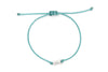 aquamarin farbenes Armband mit Fisch silber und geflochtenem Makramee Verschluss