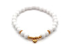 weißes Perlenarmband mit rosegoldfarbenen Perlen und Herz Anhänger