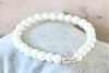 Perlenarmband ivory mit Fisch silber als Kommuniongeschenk für Mädchen  und Jungen