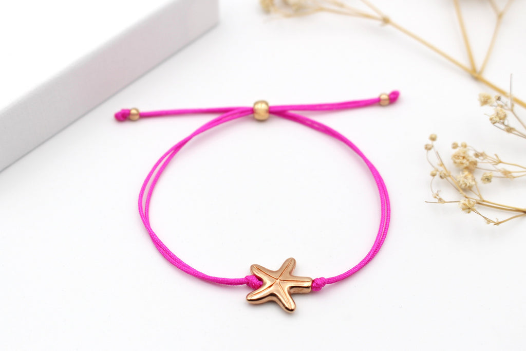 pinkes Makramee Armband mit Seestern Anhänger in rosegold