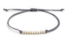 Armband kleine Perlen in grau mit silberfarbenen Perlen und Größen verstellbarem Verschluss