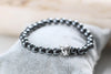 Perlen Armband für Herren mit silberfarbenem Leopard als tierisches Symbol in der Mitte
