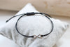 Armband Mann mit Unendlichkeitszeichen in silberfarben im Surfer Style