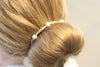 Kommunions Accessoire als Haarband mit Perlen in ivory Weiß, mit Schleife als Duttband gebunden