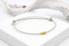 Lederarmband mit Perlen gold und verstellbarem Schiebeknoten Verschluss in ivoryfarben