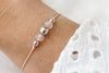 zartes Armband aus Makramee mit 3 Perlen 925 Silber am Handgelenk getragen 